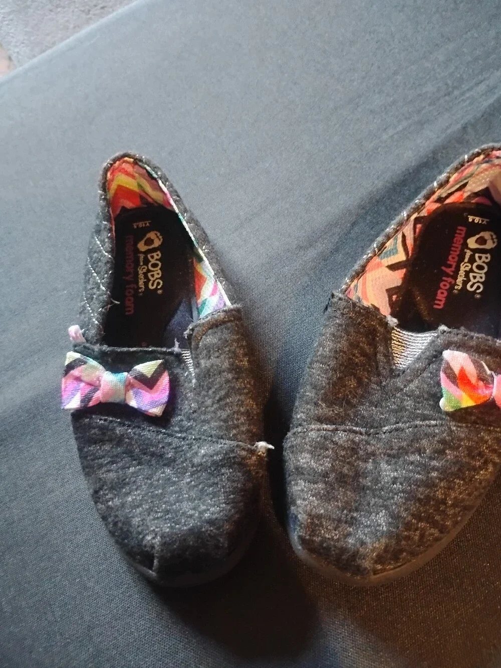 BOBS from Skechers Black Girls Slip-On Shoes with Multicolor Bow